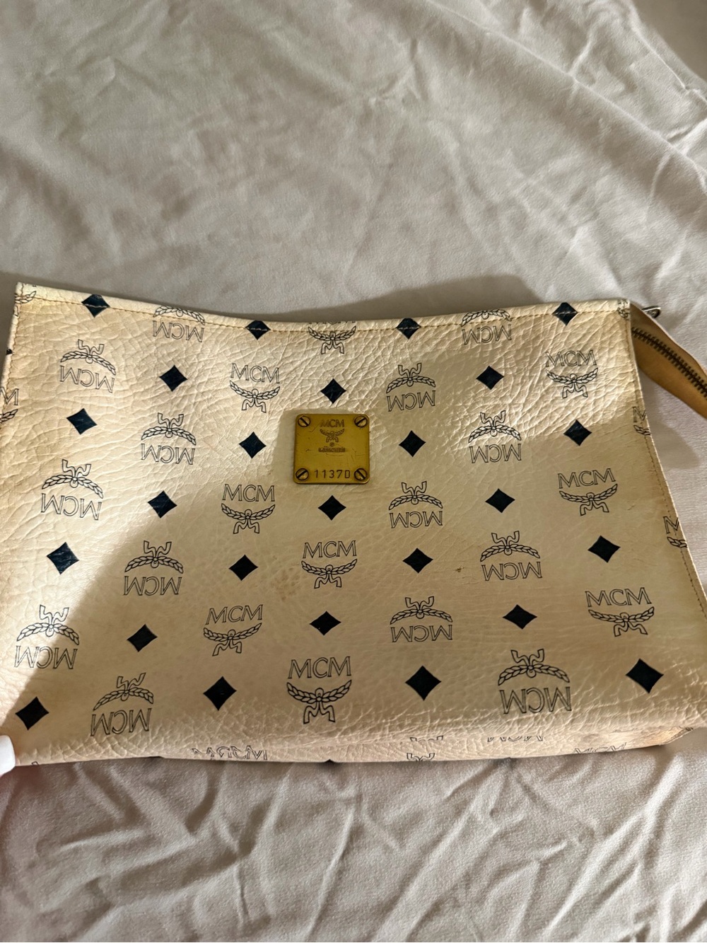 MCM Cream Logo Zip Wristlet with Gold Plaque